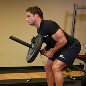 man performing the pull portion of the Two-Arm Long Bar Row https://get-strong.fit/Fitness