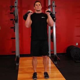 How to perform Kettlebell Split Jerk step 4 of 4 https://get-strong.fit/Fitness