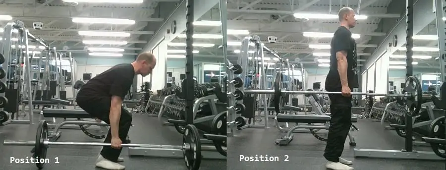 man showing how to do the Suitcase Deadlift https://get-strong.fit/The-Suitcase-Deadlift/Exercises